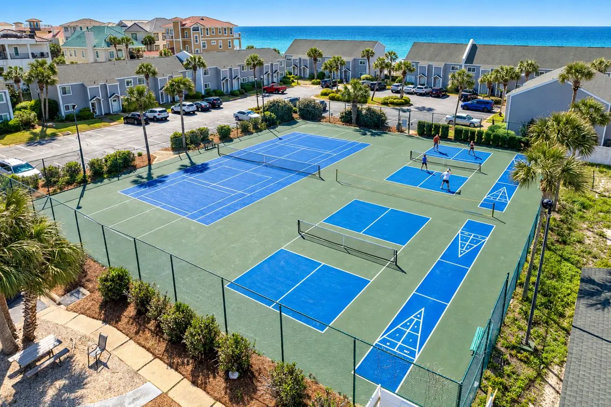 Aerial view of tennis, pickleball and shuffleboard courts a short walk from the Gulf
