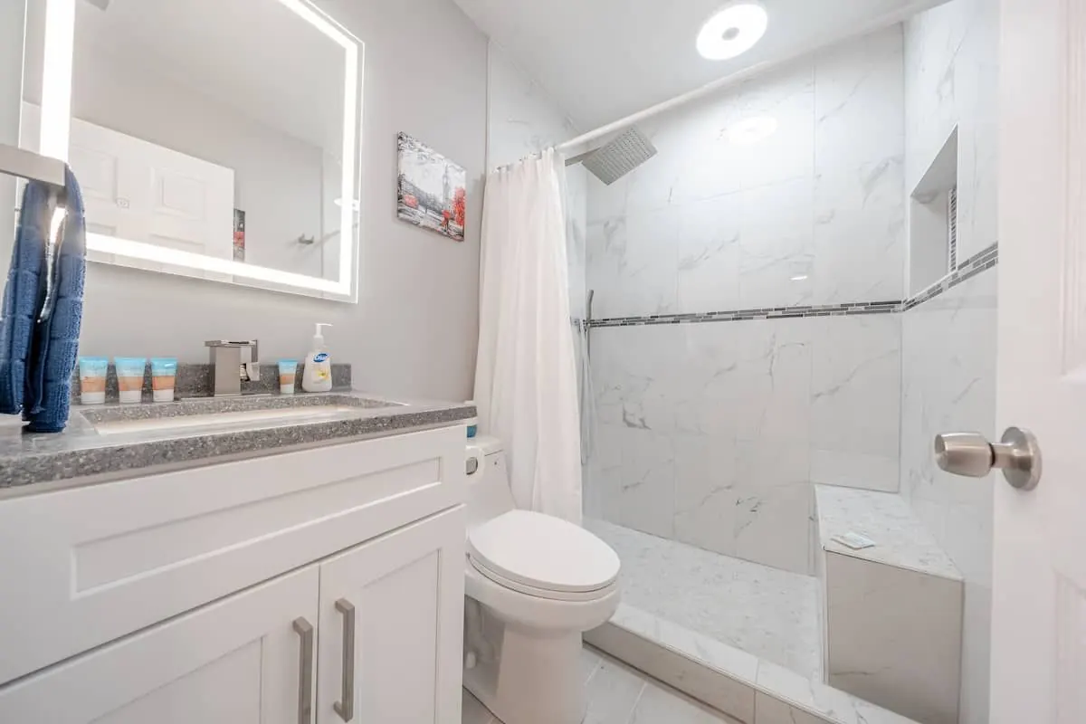 Bathroom with marble walk-in shower