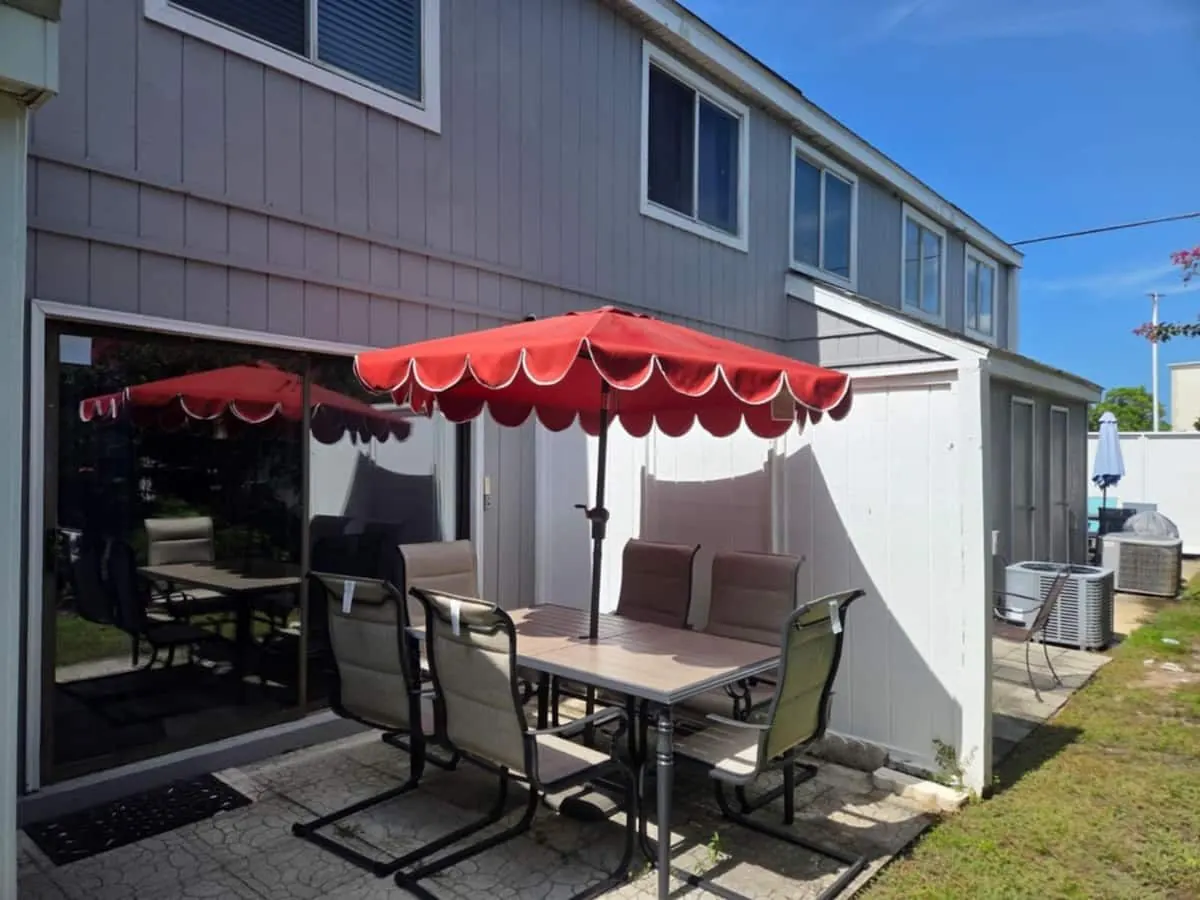 Private patio with umbrella